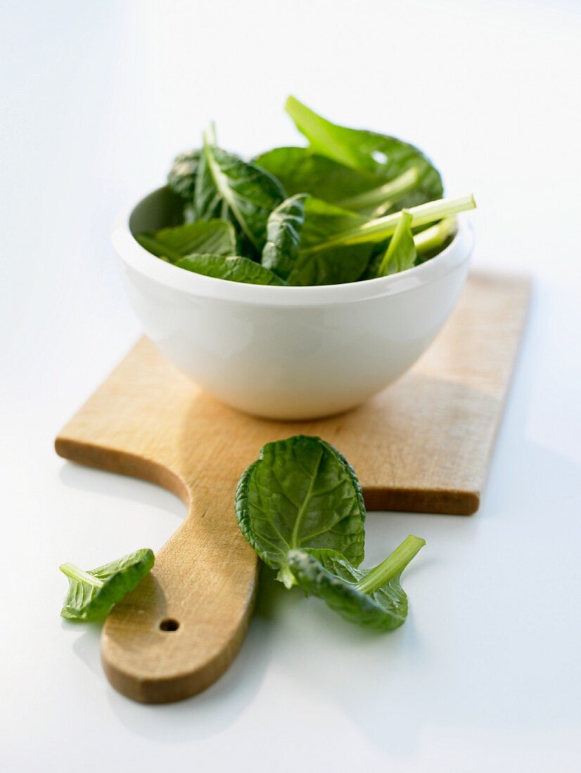 Shiso in a bowl and on a wooden board