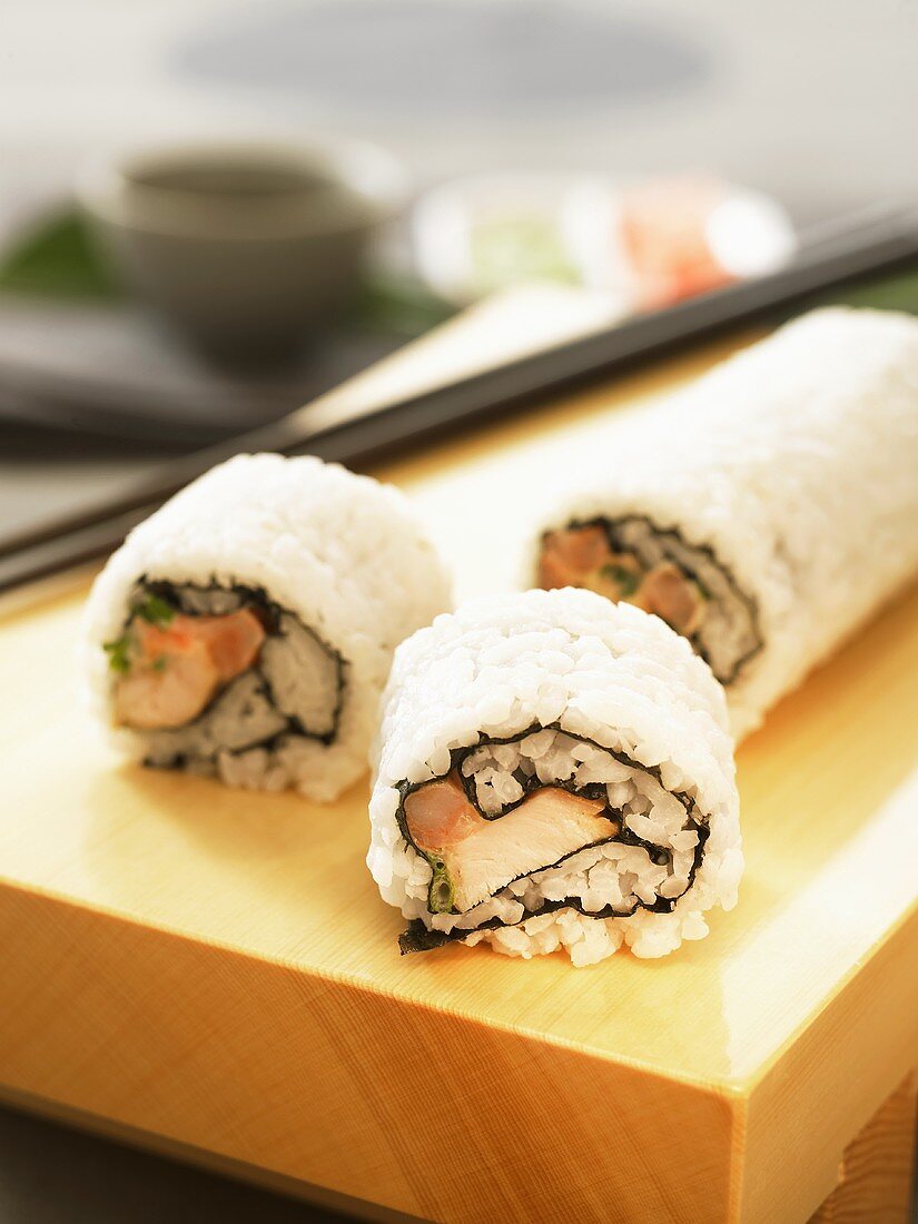 Sushi (ura-maki) on a sushi platter