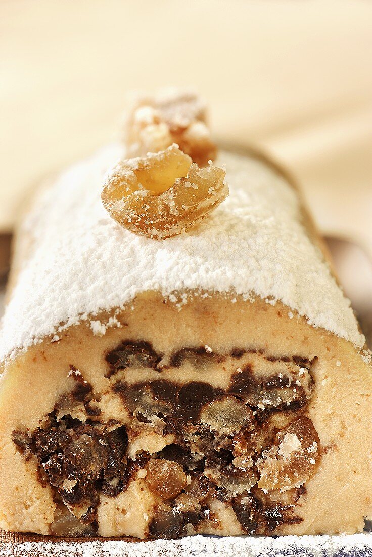 Chestnut roll with icing sugar