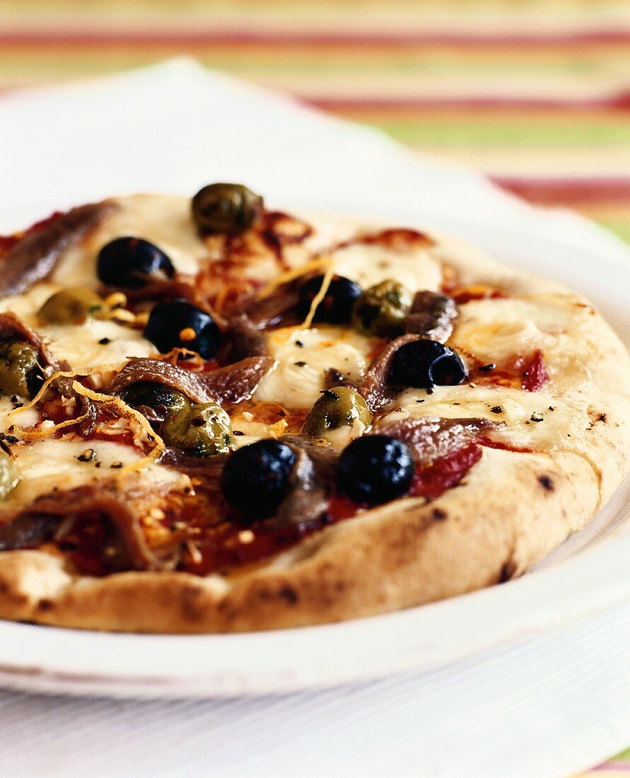 Pizza with anchovies and olives