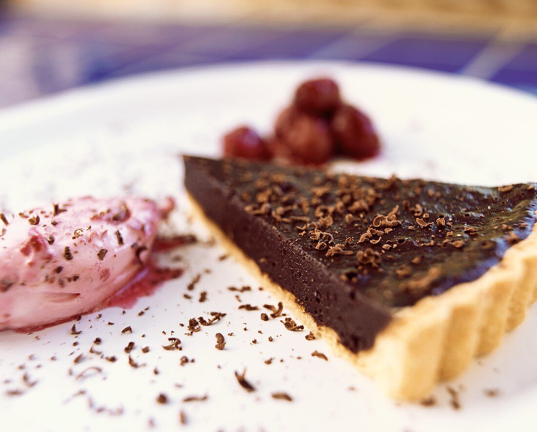 Chocolate truffle tart with cherry cream