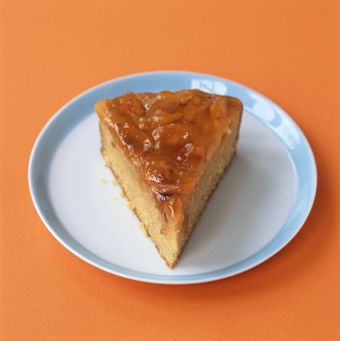 A piece of orange cake