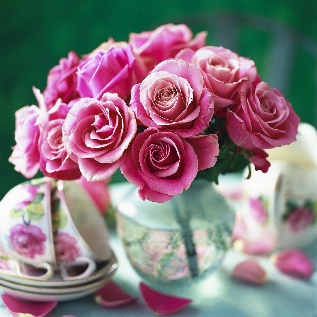 Pink roses and cups and saucers