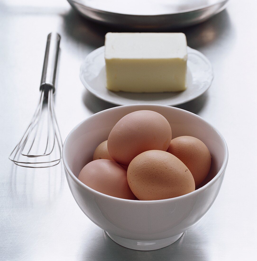 Ingredients for omelette: eggs and butter