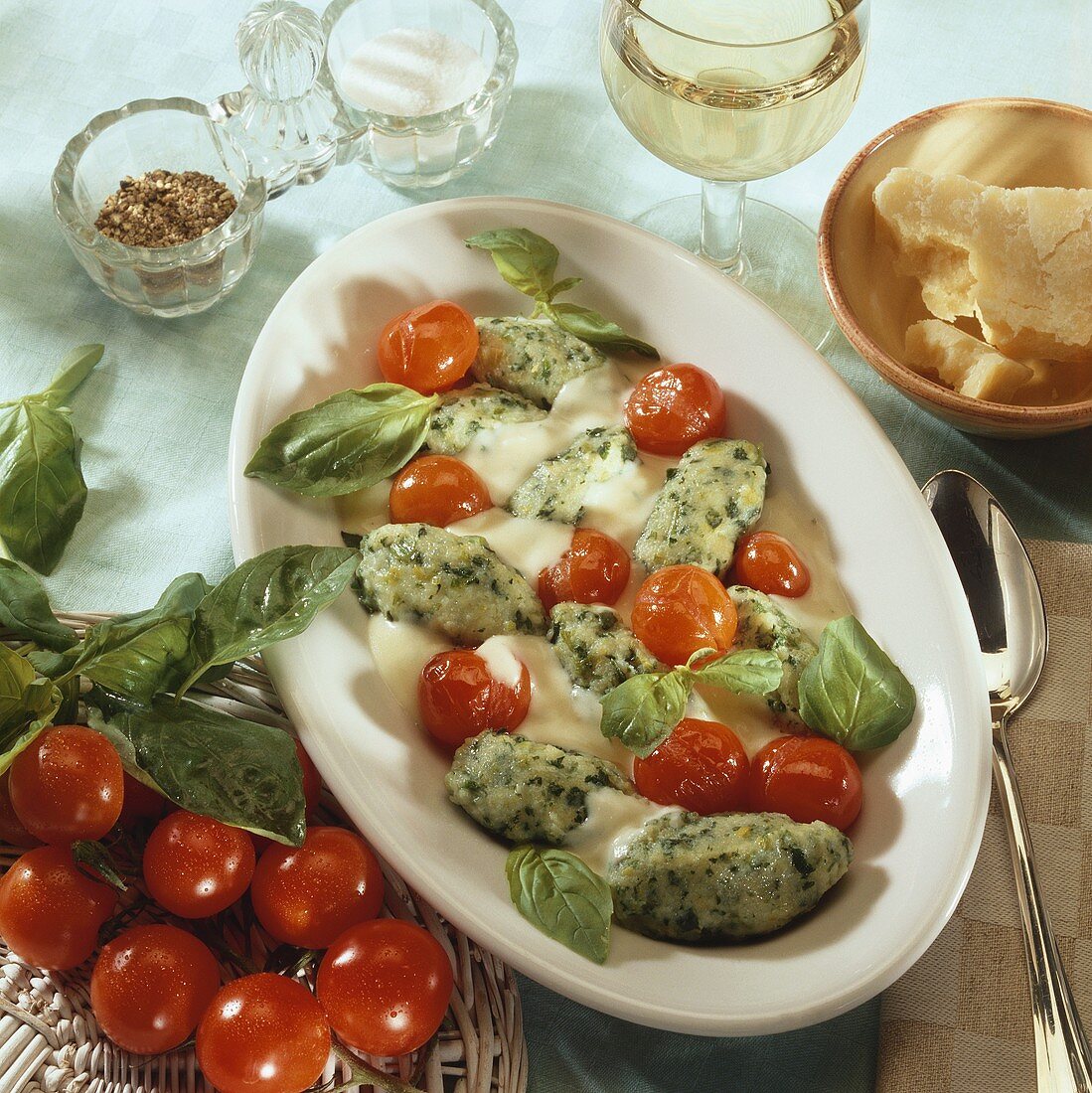 Potato and spinach gnocchi with cherry tomatoes
