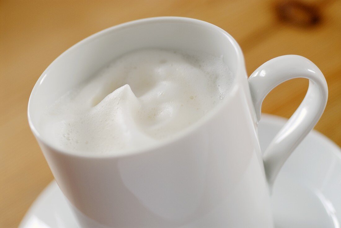 Milk froth in a cup