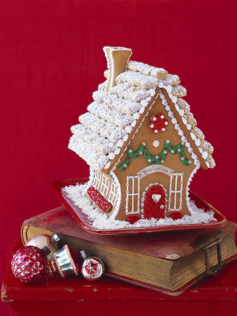 Gingerbread house on an old book