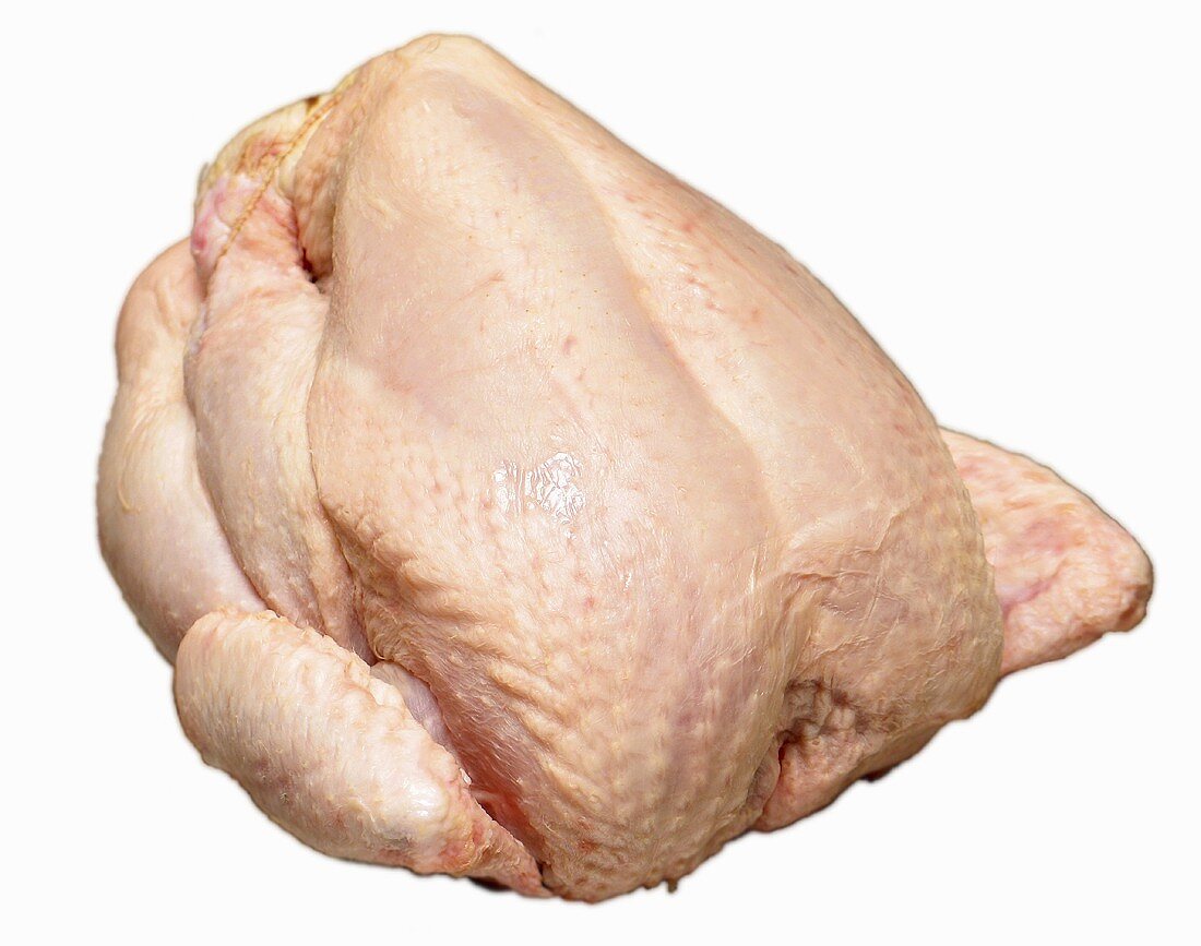 A raw chicken on white background