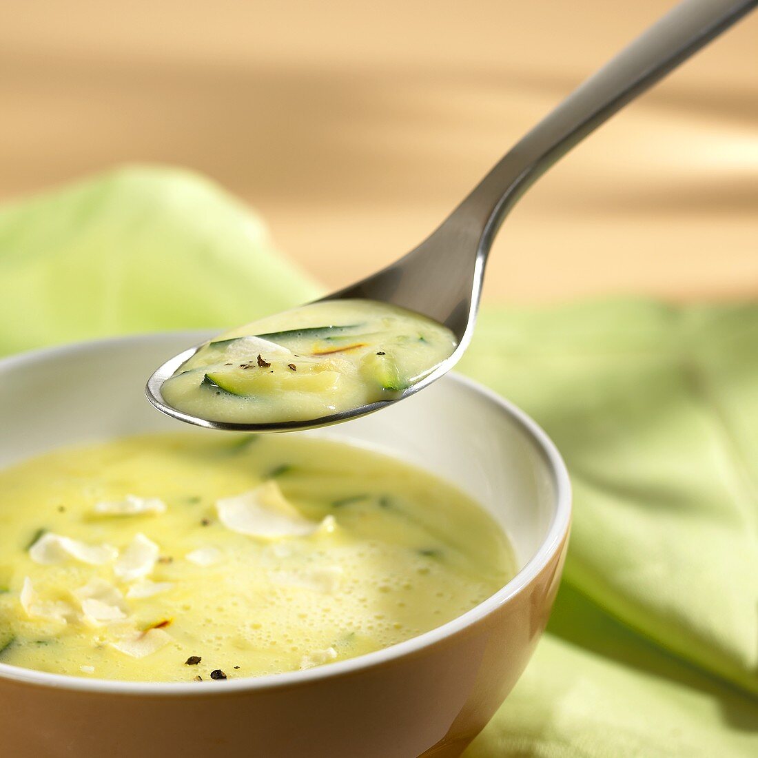 Courgette soup on a spoon