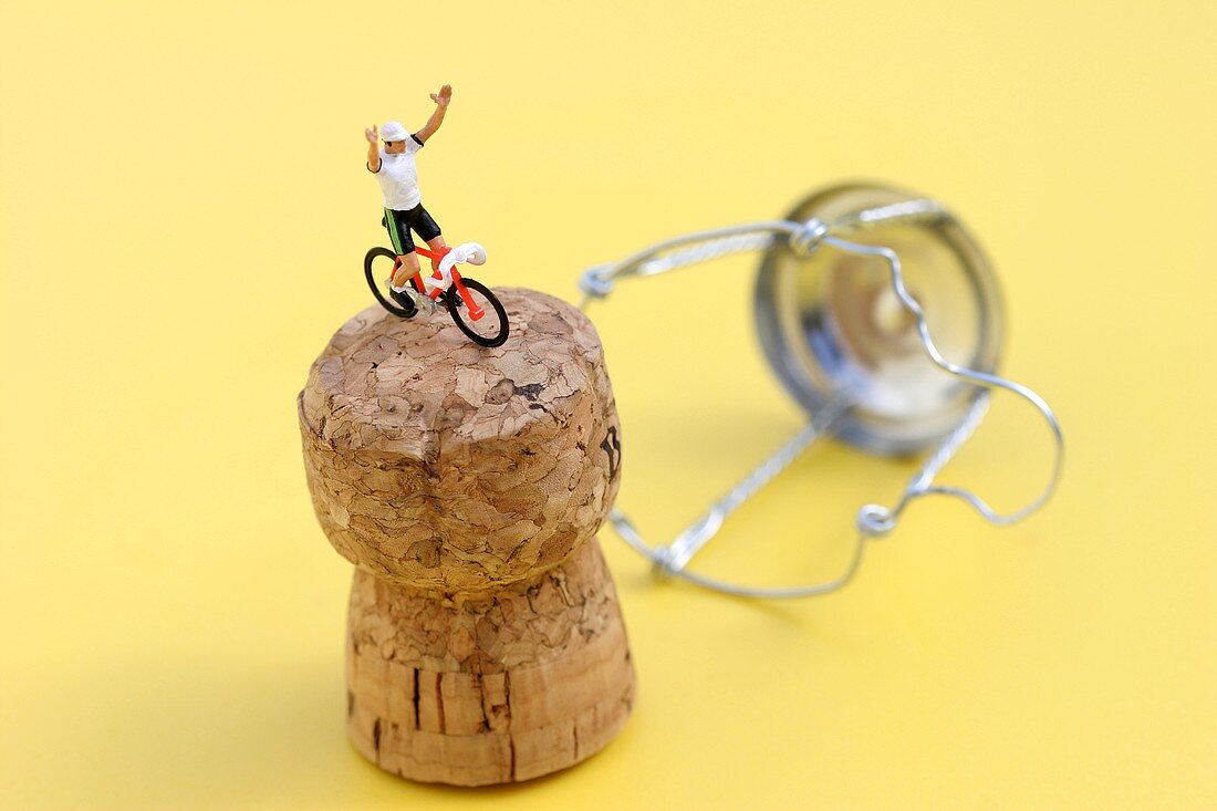 Champagne cork with racing cyclist