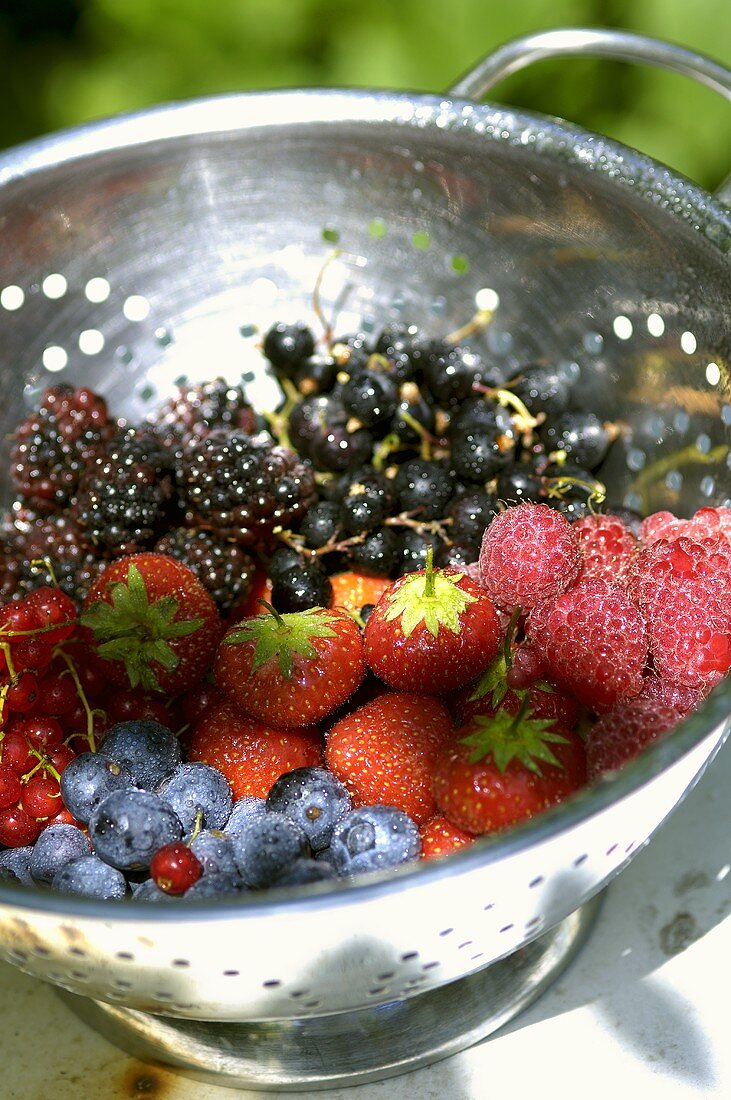 Mixed berries in a colander