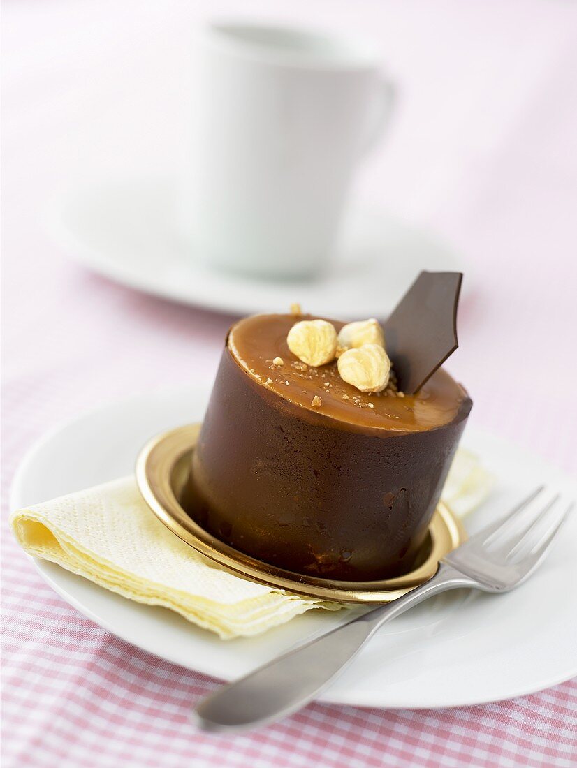 Small chocolate cake with nuts