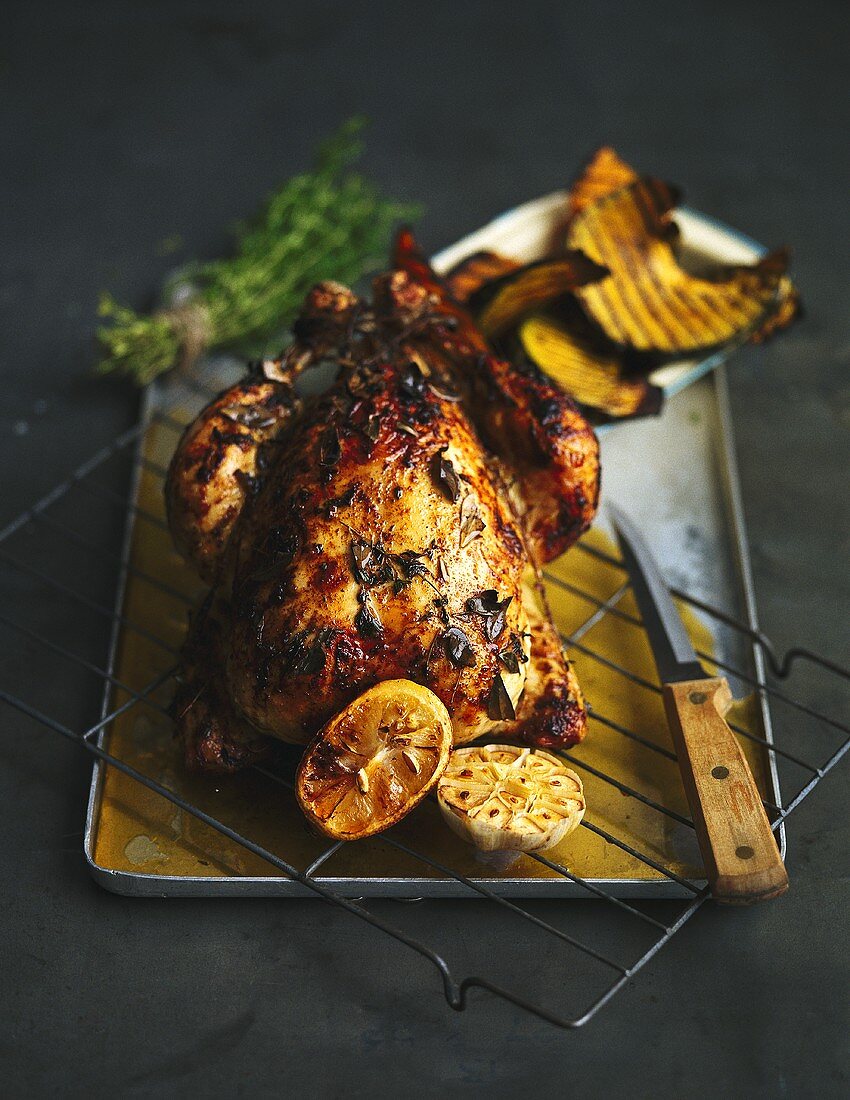 Roast chicken with garlic and grilled vegetables