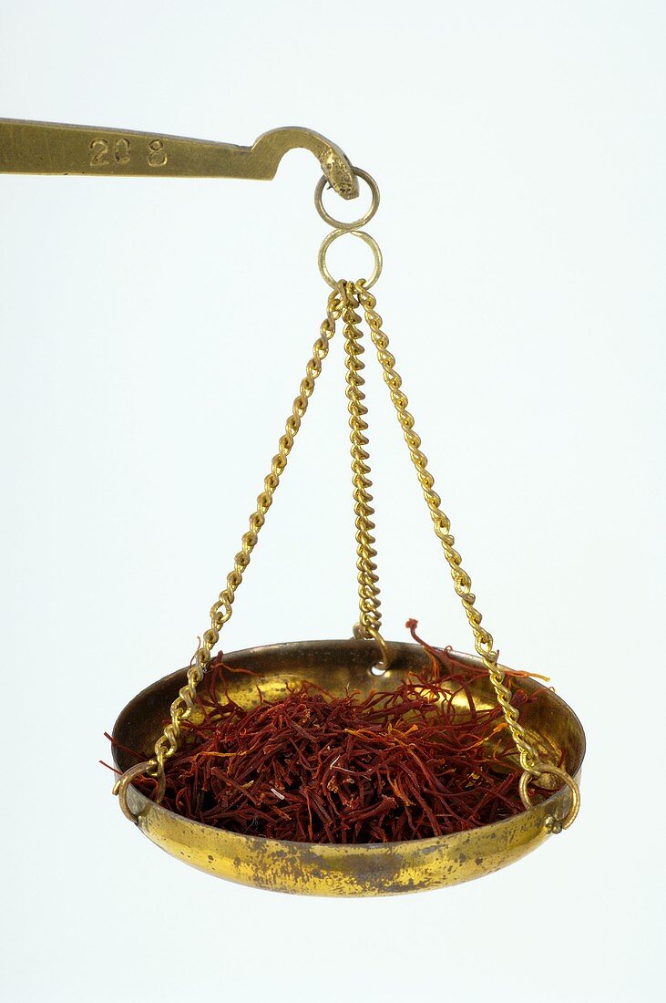 Saffron threads in a scale pan