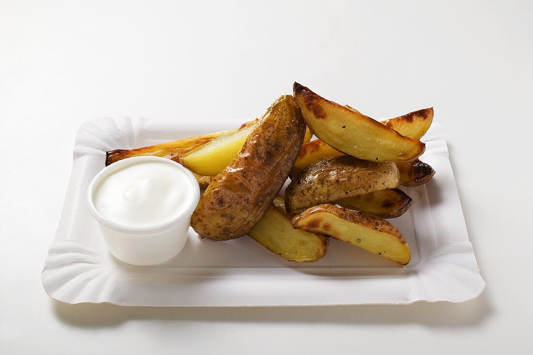 Baked potato wedges with sour cream