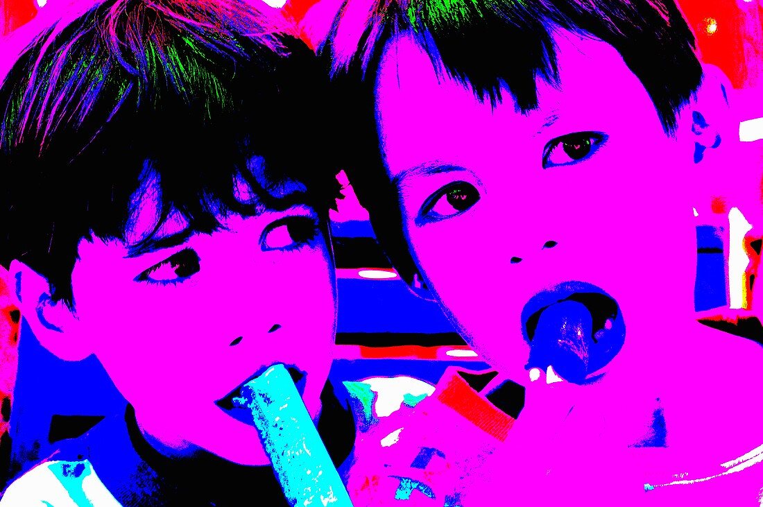 Two children licking ice creams