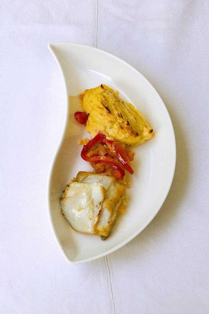 Cod with potato gratin and peppers
