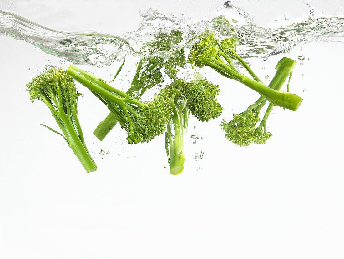 Broccoli falling into water