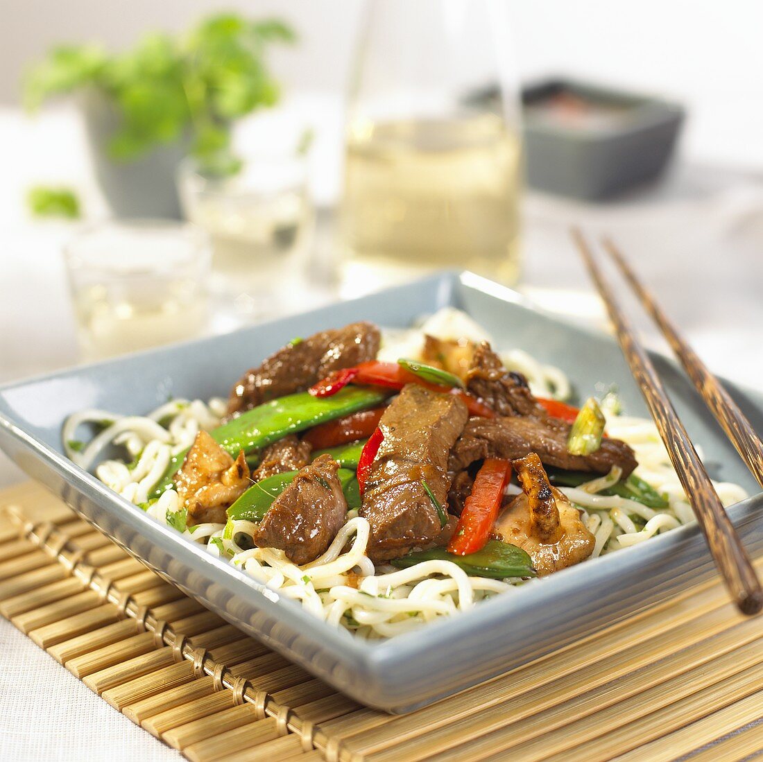 Fried beef and vegetables on noodles