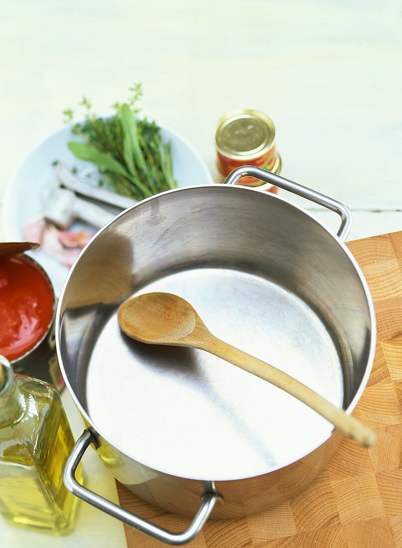 Pan with ingredients for tomato sauce