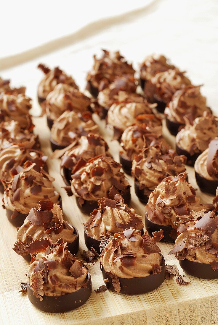 Chocolate petit fours in rows