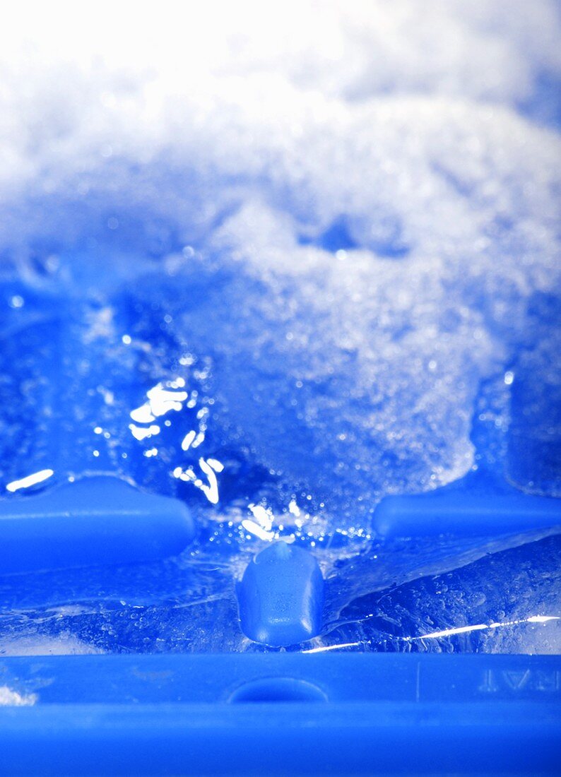 Iced-up ice cube tray