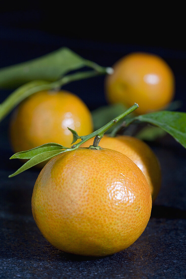 Fresh clementines with leaves