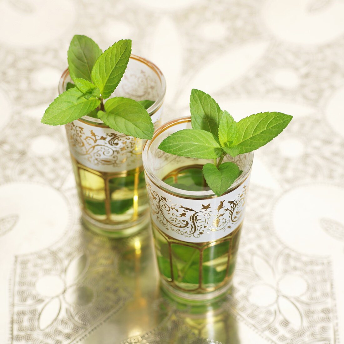 Peppermint tea in two Middle Eastern glasses