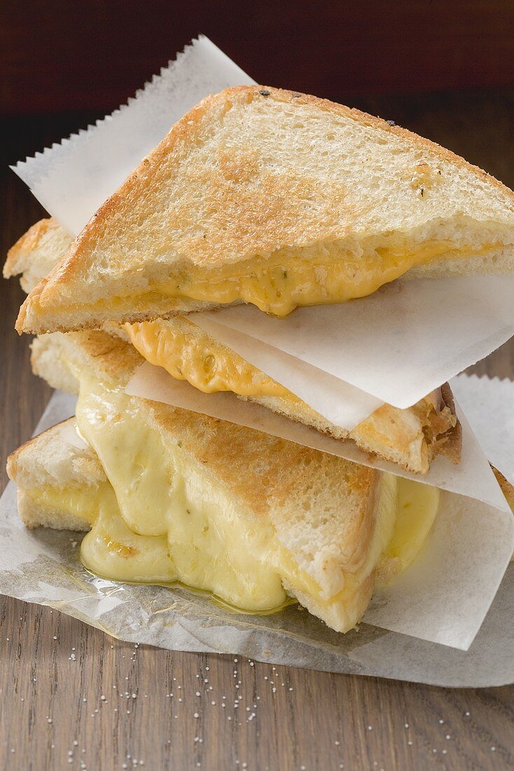 Toasted cheese sandwiches, in a pile