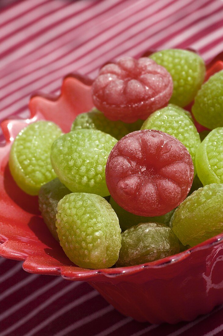 Fruit sweets in red dish