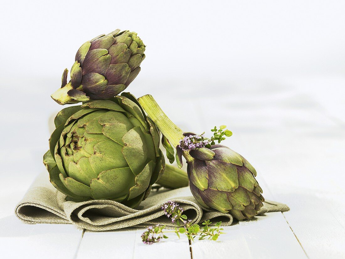 Artichokes on green cloth