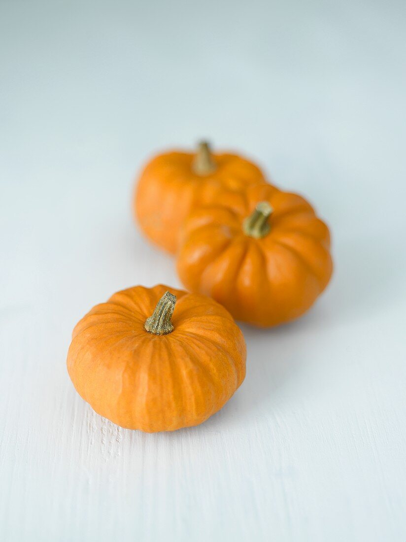 Three orange pumpkins