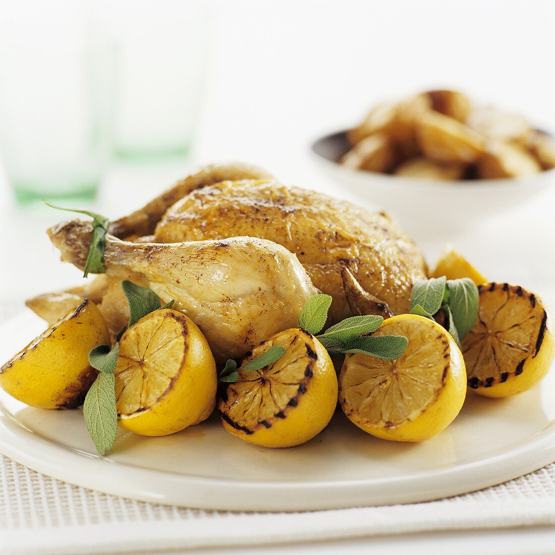 Roast chicken with lemons and sage