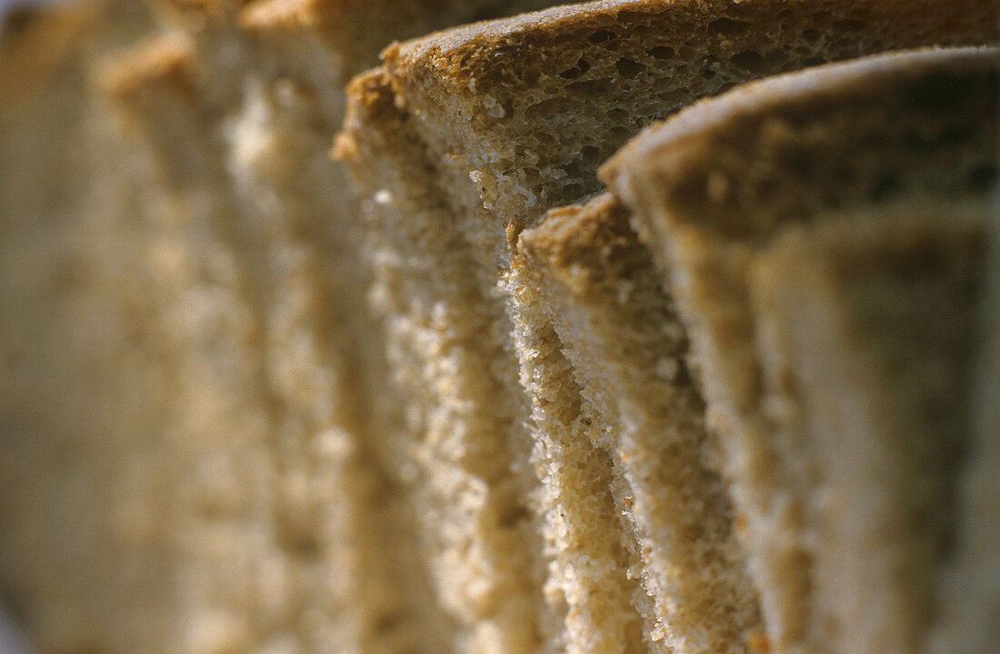 Slices of bread, stacked one behind the other