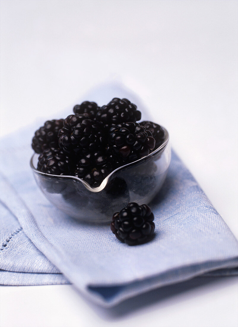 A small dish of blackberries (can also represent wine bouquet)