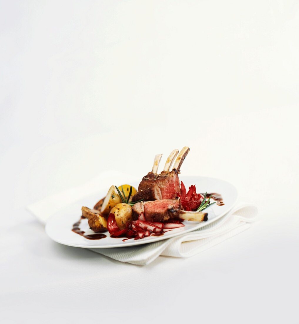 Rack of lamb with red wine onions and rosemary potatoes