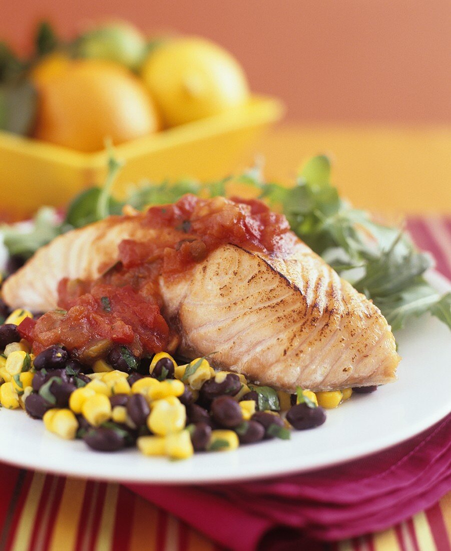 Salmon with tomato salsa, black beans and sweetcorn