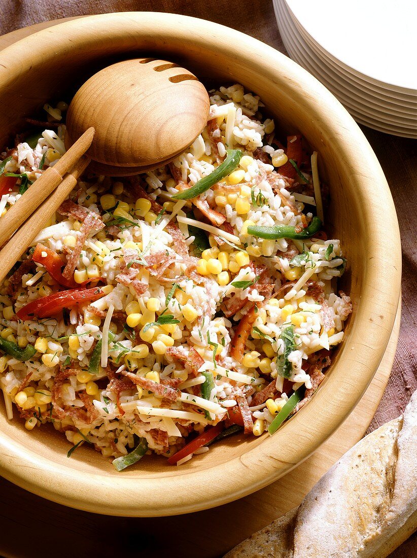 Hungarian Rice Salad in a wooden Bowl