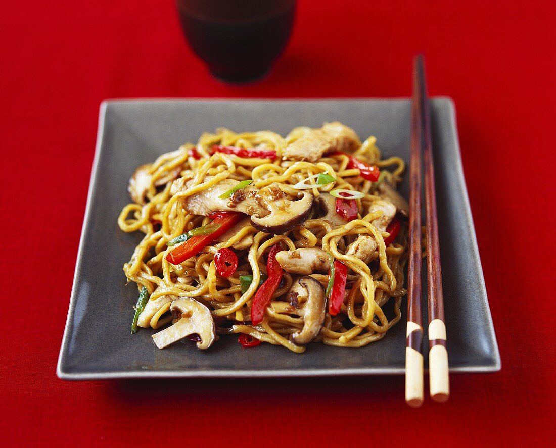 Asian egg noodles with pork and shiitake mushrooms