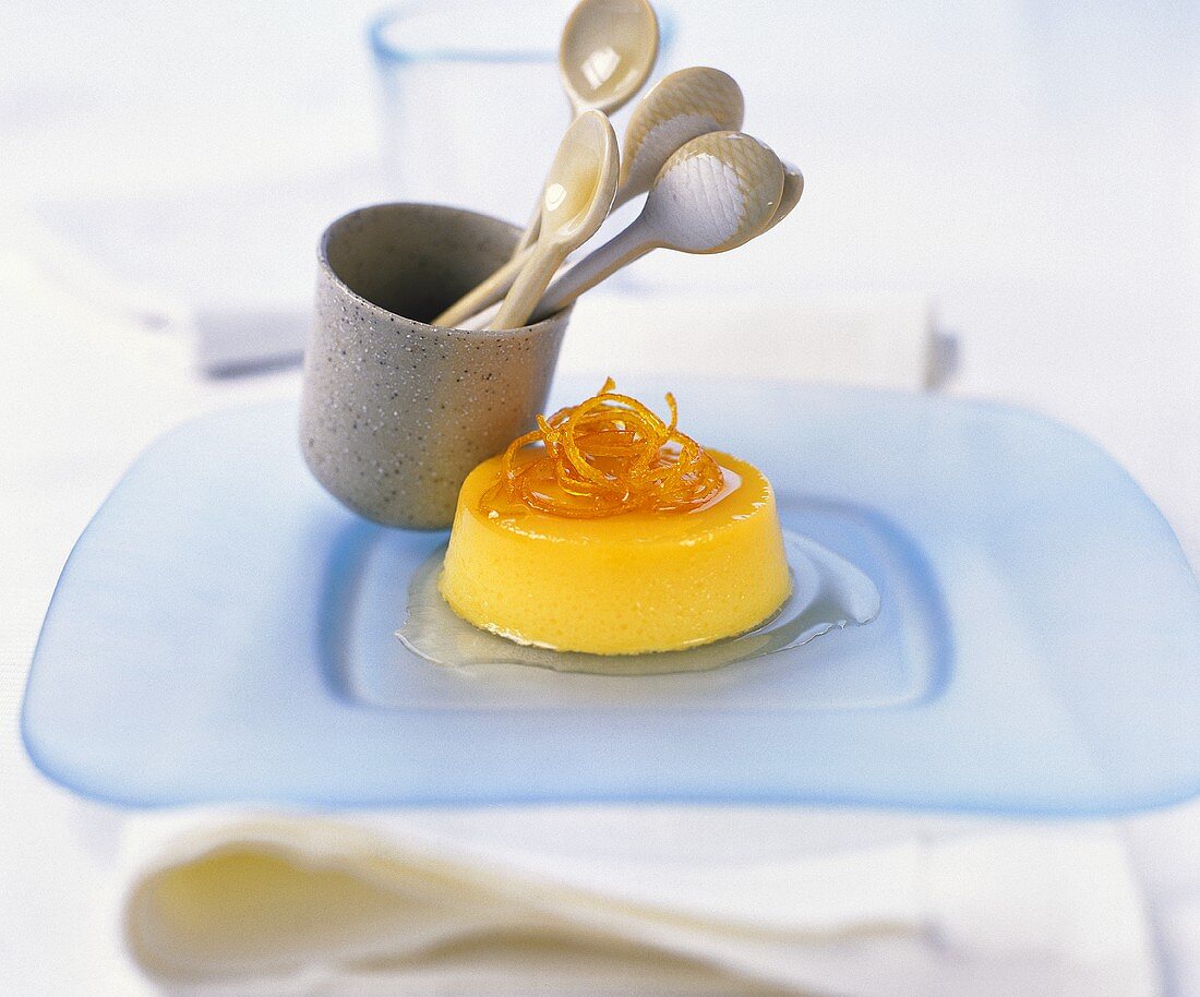 Orange custard with four spoons