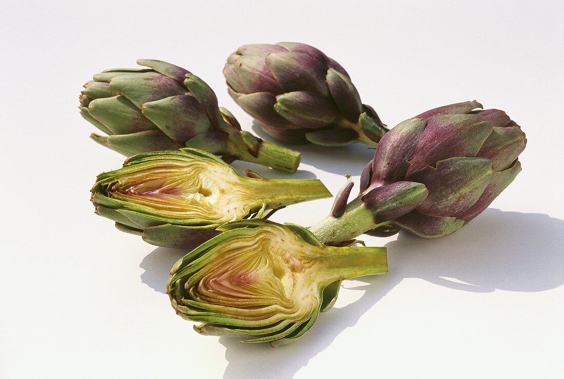 Several purple artichokes