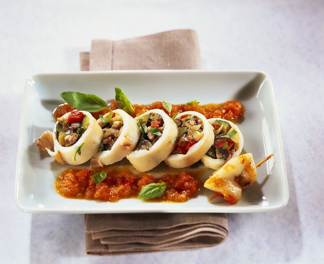 Braised squid with vegetable stuffing and tomato sauce