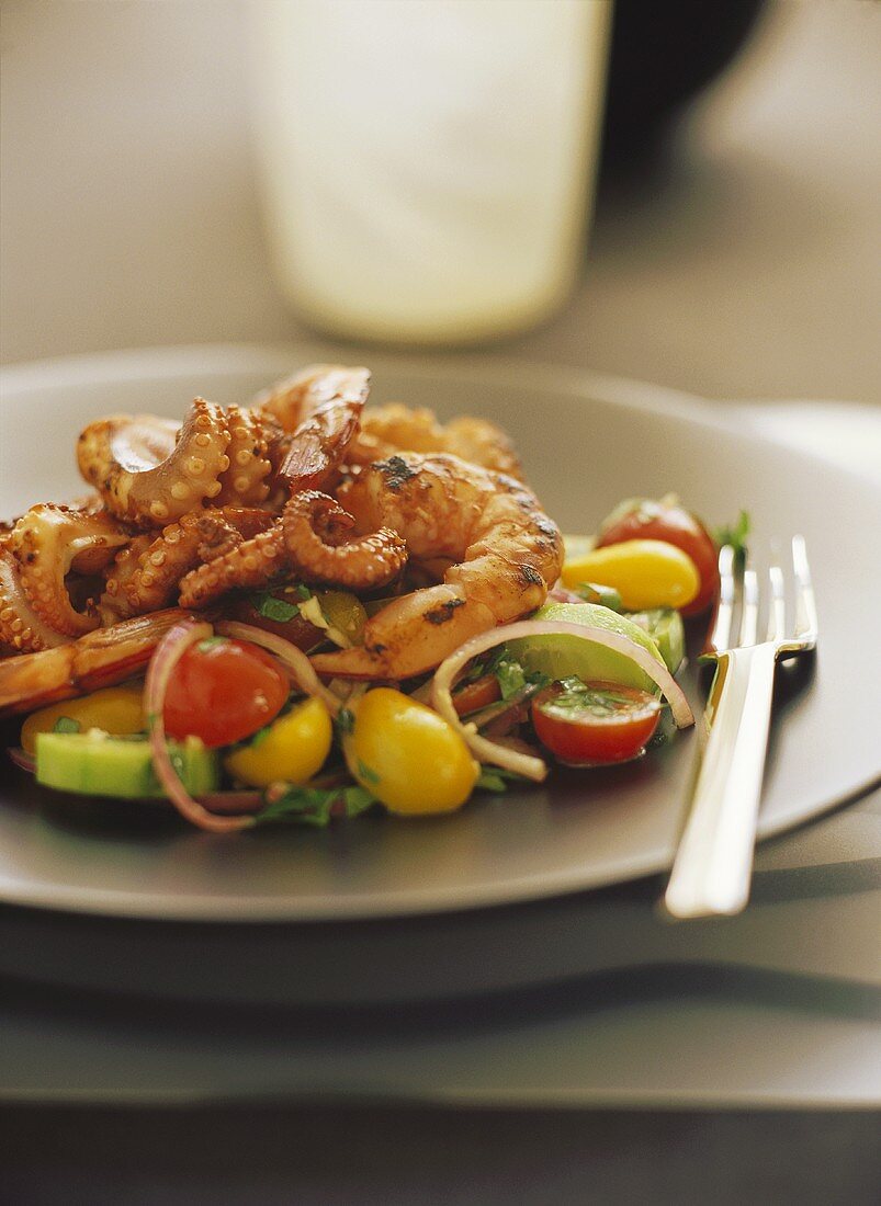 Marinated octopus on bed of vegetables