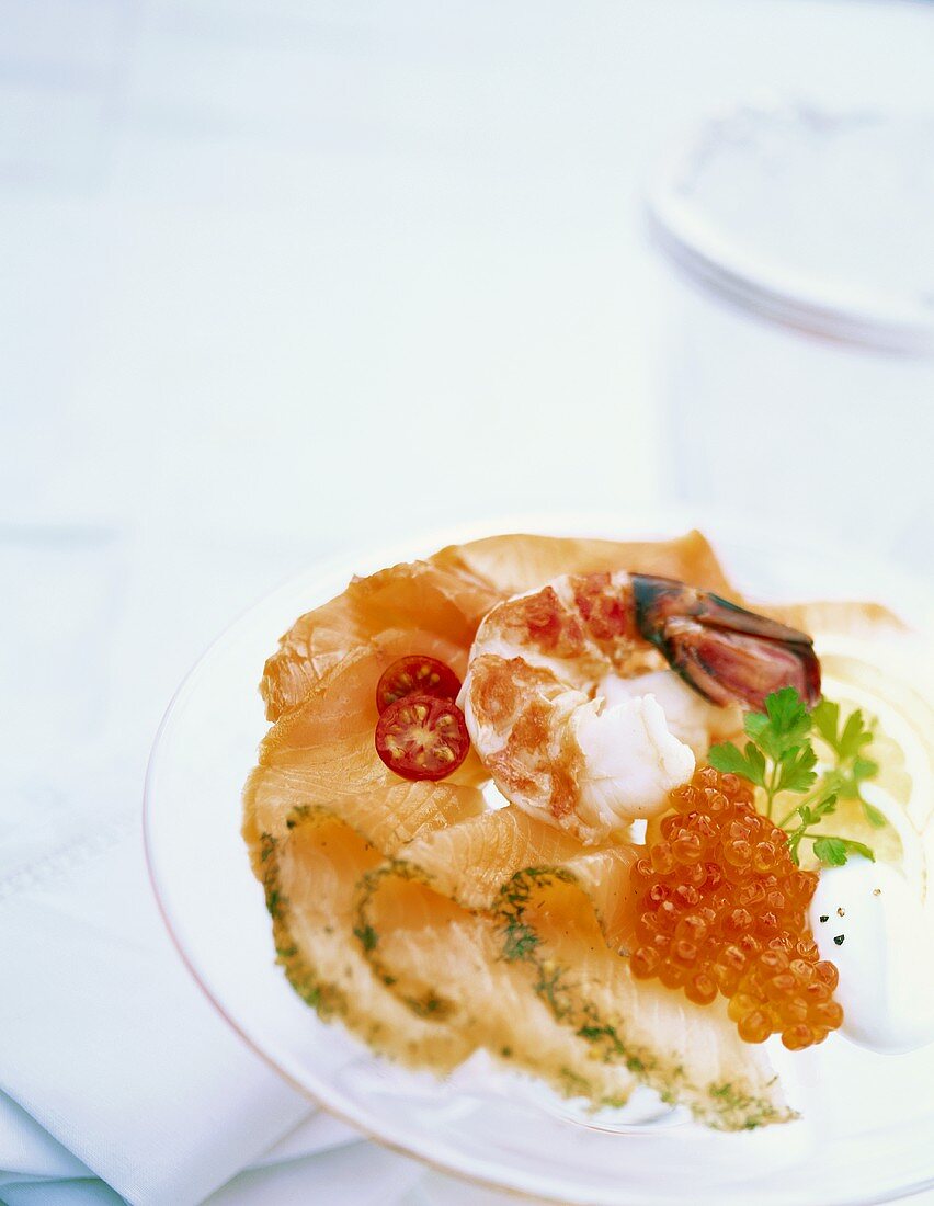 Salmon terrine with shrimp, salmon caviar & tomato vinaigrette