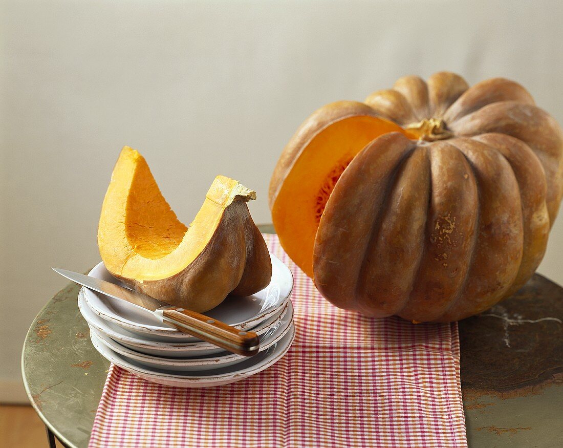 A winter squash with a piece cut out