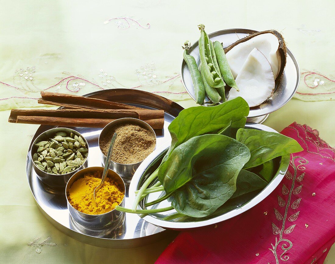 Indian still life with spices, vegetables and nuts