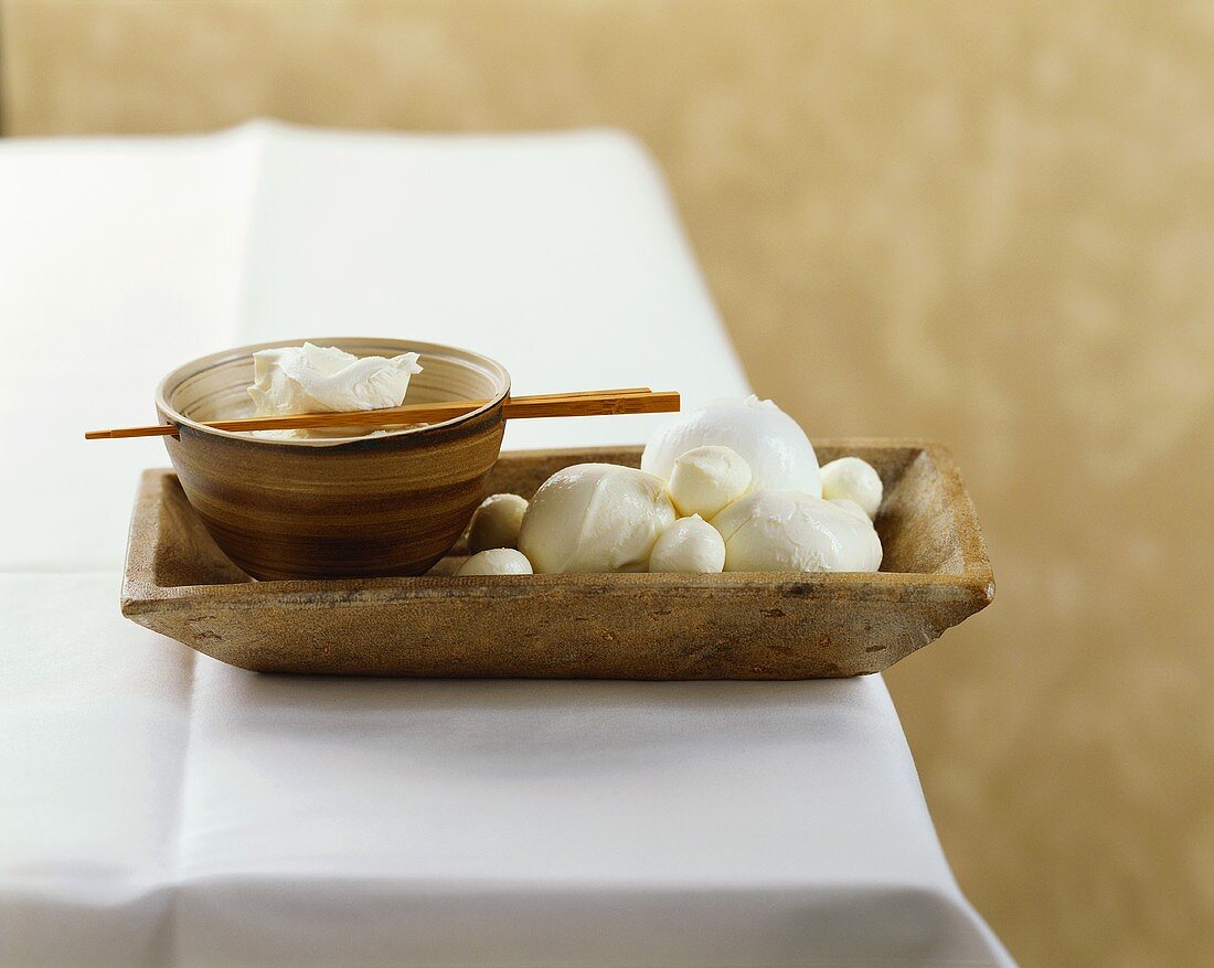 Mozzarella in a square wooden bowl