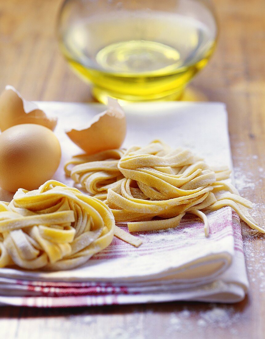 Home-made ribbon pasta and ingredients