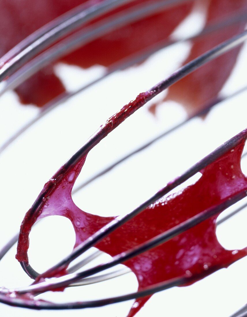 Whisk with redcurrant jelly
