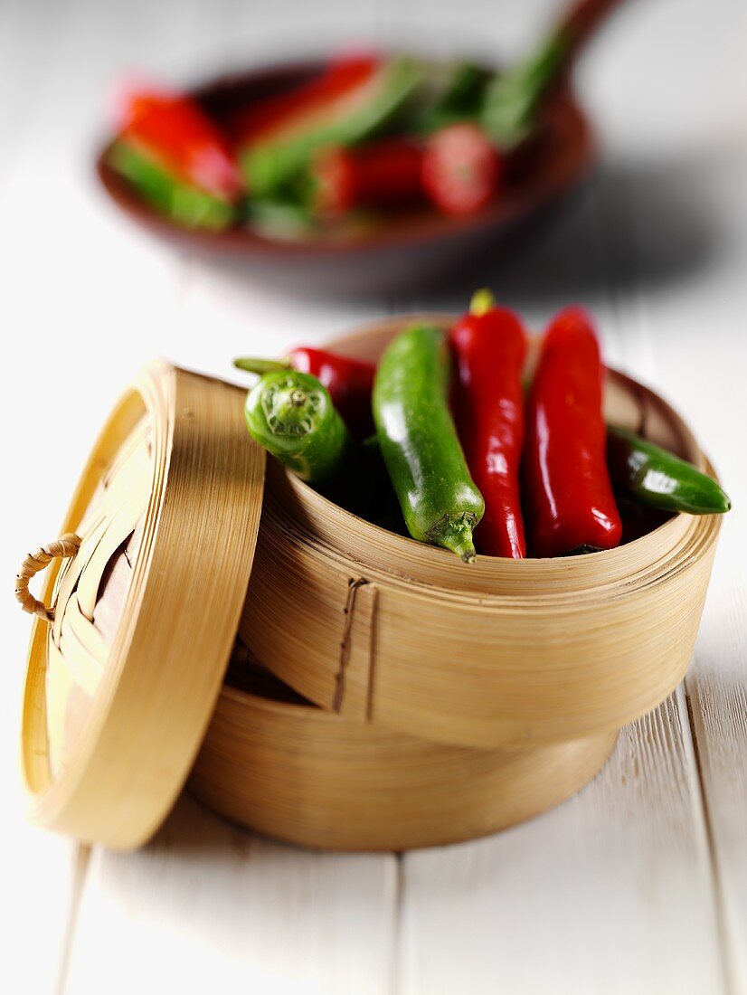 Chili peppers in a steaming basket